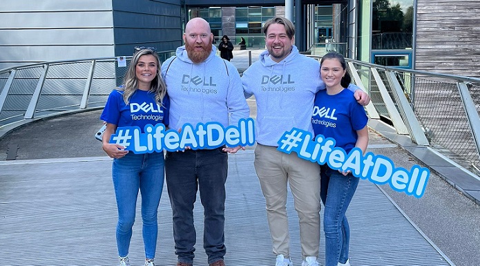 Students holding Life At Dell signs